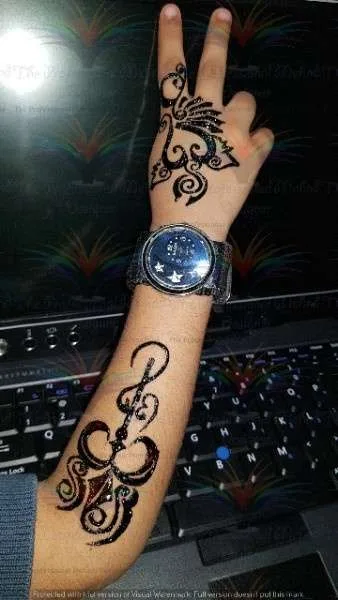 two tattoo one hand