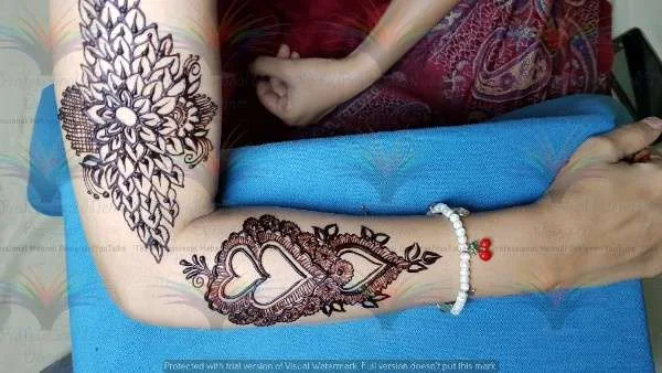 mehndi on bazo and shoulder