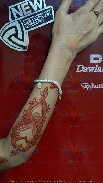 kohni par mehndi ka design