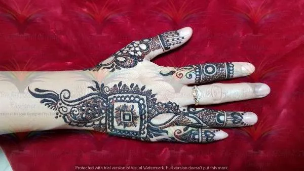 50 Best Backhand Mehndi Design Pictures and Videos 27 Mahandi Design Back Hand Black cone
