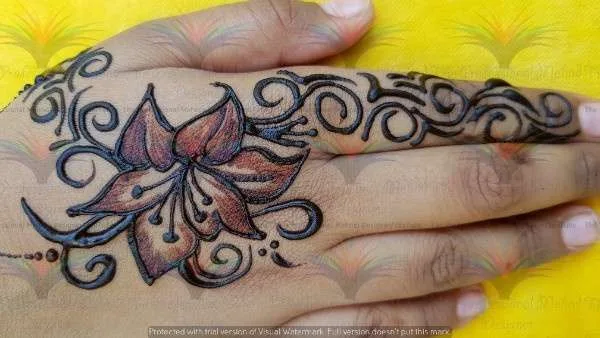 50 Best Backhand Mehndi Design Pictures and Videos 21 Lilly Flower Back Hand Side Mehndi Design
