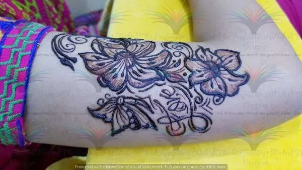 butterfly on shoulderr with cone mehndi
