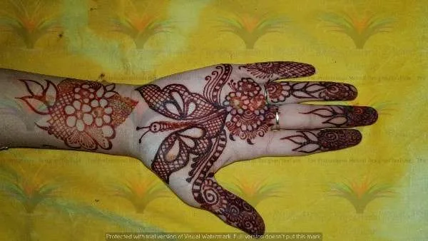 50 Best Backhand Mehndi Design Pictures and Videos 22 Flower Design Back hand side Mehndi Design