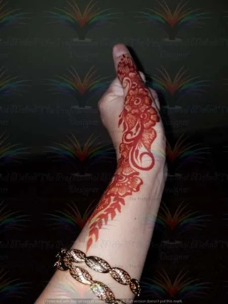 500+ Captivating Backhand Mehndi Designs: A Visual Showcase 224 a hand with henna tattoo on it