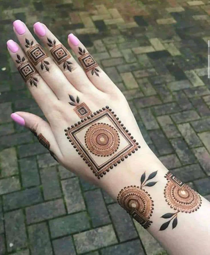 250+ Best Mehndi Designs for Hand Picture and Videos 182 back hand unique mehndi design