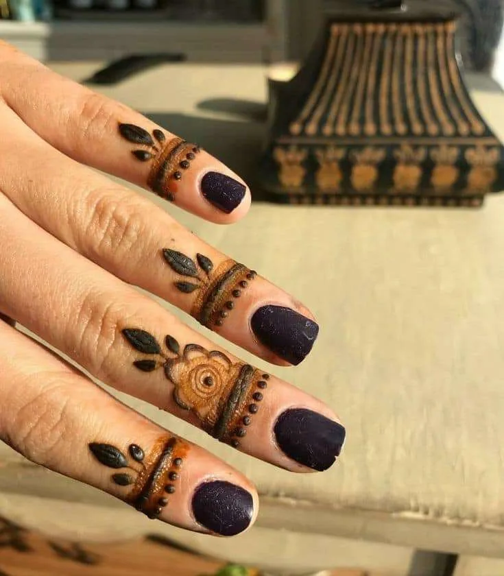250+ Best Mehndi Designs for Hand Picture and Videos 173 black mehndi on nail and fingers