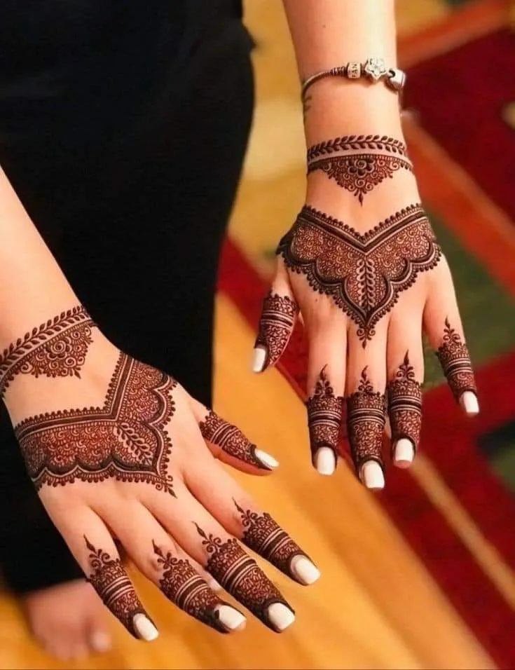 250+ Best Mehndi Designs for Hand Picture and Videos 104 back side mehndi applied on both hand