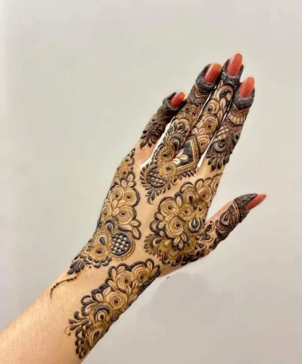 250+ Best Mehndi Designs for Hand Picture and Videos 97 back side mehndi side on hand show off