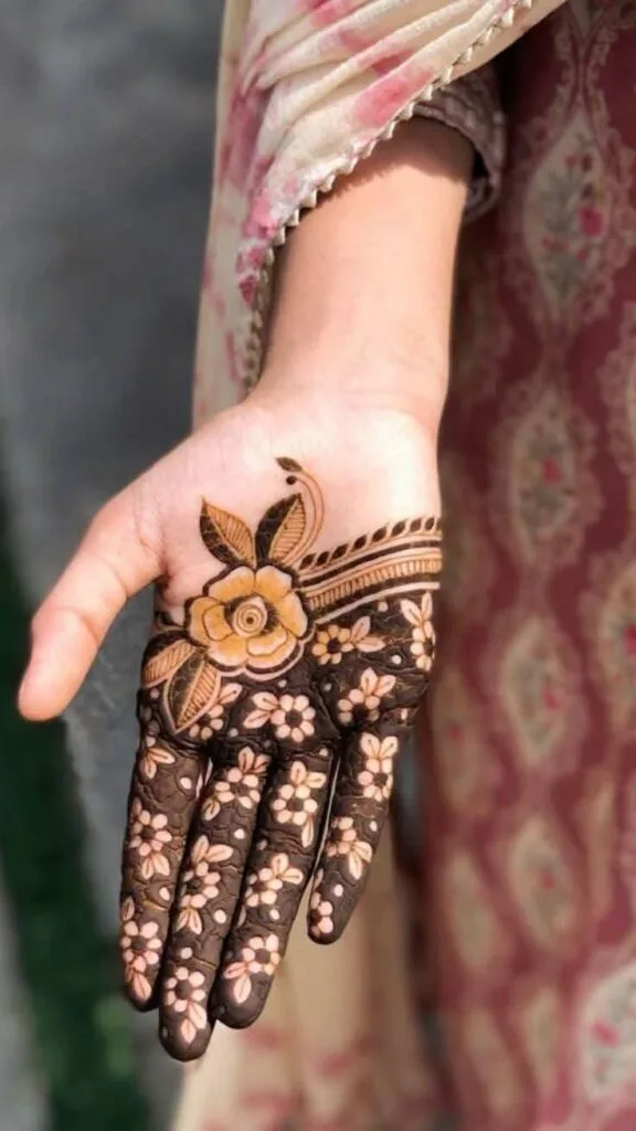 250+ Best Mehndi Designs for Hand Picture and Videos 30 mehndi on plam with female cloth view