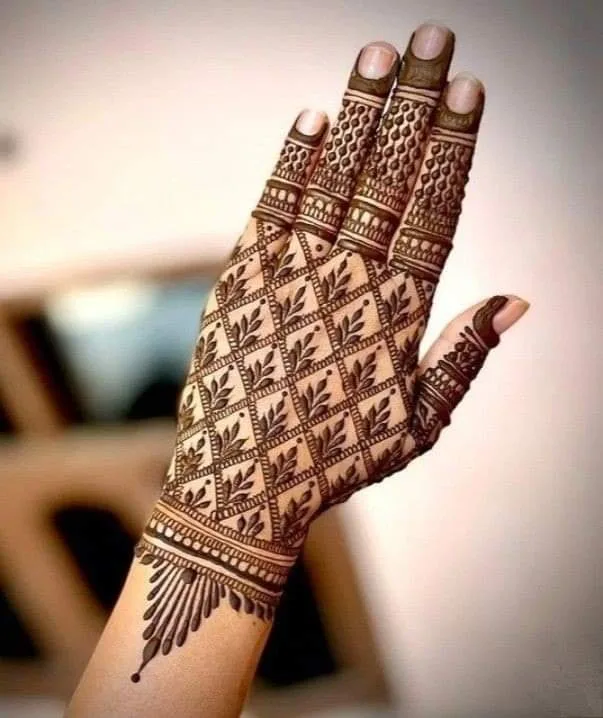 250+ Best Mehndi Designs for Hand Picture and Videos 24 peacock style mehndi on back hand side