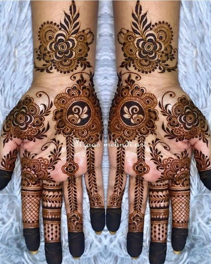 250+ Best Mehndi Designs for Hand Picture and Videos 9 showing frot hand mehndi on both hand