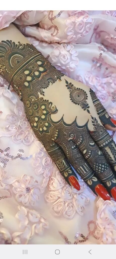 beautiful cone mehndi design with red nai polish