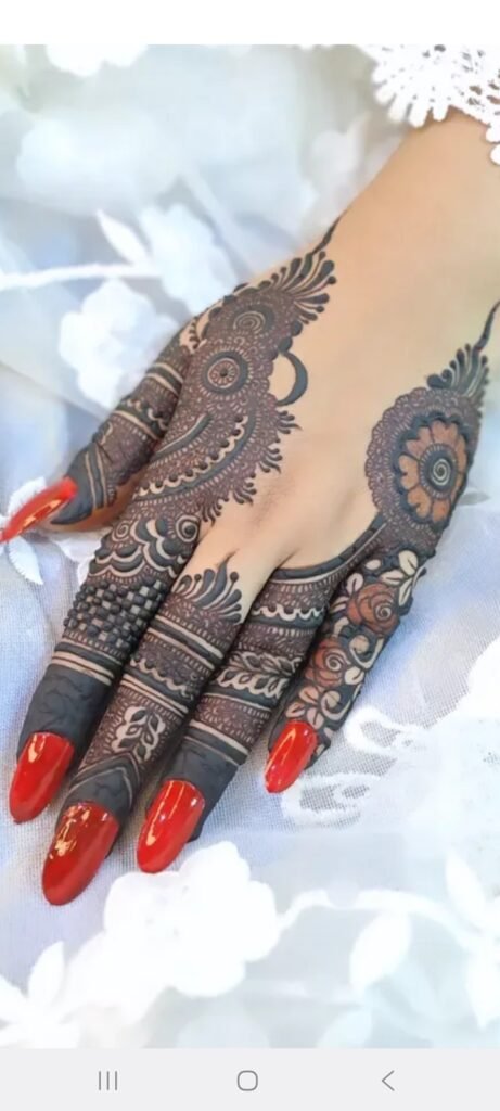 red nail polish with beautiful cone mehndi design